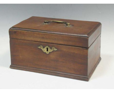 A George II mahogany tea caddy, the rectangular hinged lid with brass handle enclosing an adapted interior with pewter fittin