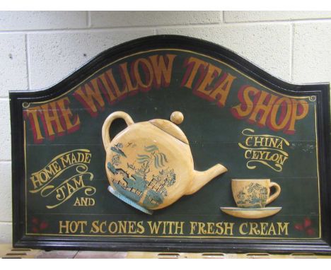 'The Willow Tea Shop' painted advertising sign, 20th century, of arched form with applied teapot and cup decoration, 72 x 104