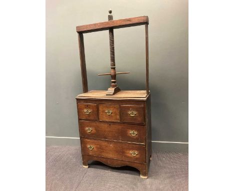 A 19th century oak linen/ book press with three short over two long drawers on bracket feet, 199 x 88 x 46cm