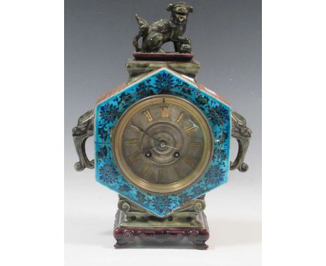 A Chinese style ceramic mantel clock by W. C. TRIMNELL PARIS, the hexagonal painted body surmounted by a pho dog, 32 x 24 x 1