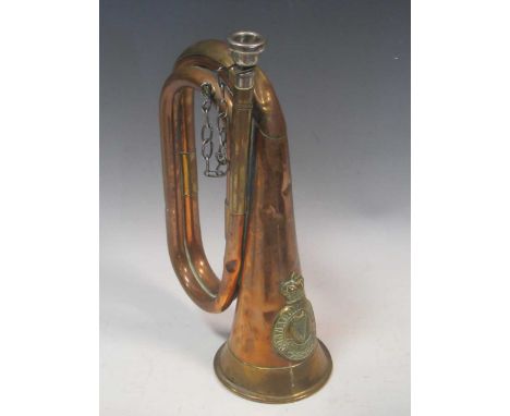 A Connaught Rangers crested copper bugle, stamped 'Potters Aldershot' and marked 'Littlehampton Unit' in script, length 28.5c