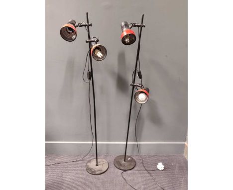 A pair of Danish modern standing lights (137cm high); together with another lamp on tripod base, 154cm; and a modern Italian 