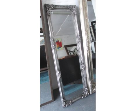 PIER MIRROR, with a silver gilt frame and bevelled plate, 50cm W x 151cm H.