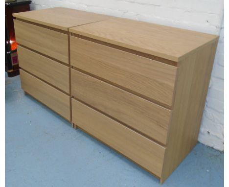 STORAGE CHESTS, a pair, contemporary light oak each with three drawers, 77cm x 80cm x 48cm. (2)