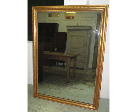 WALL MIRROR, Napoleon III giltwood with incised and beaded rectangular frame, 161cm x 118cm.