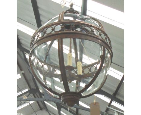 GLOBE LANTERN, three branch in a bronzed metal frame, 51cm diameter plus chain.