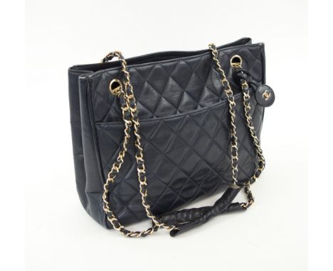 CHANEL VINTAGE BAG, blue quilted leather with gold tone hardware, woven shoulder straps with leather shoulder pads, leather i