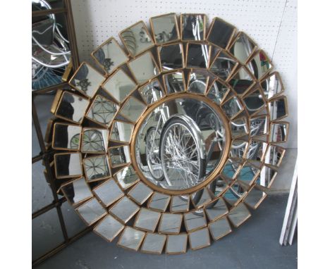 MIRROR, bevelled circular with multi mirrored border in gilded metal frame, 109cm.