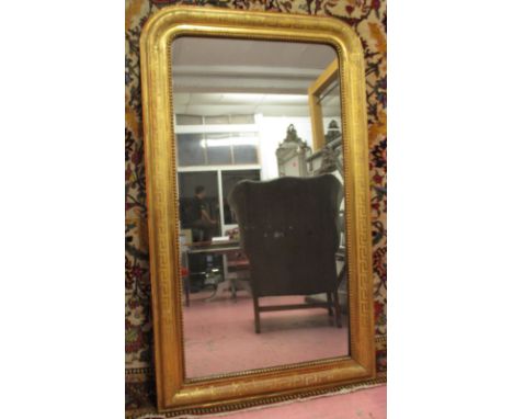 WALL MIRROR, Napoleon III giltwood with Greek key incised arched rectangular frame, 150cm H x 90cm W.