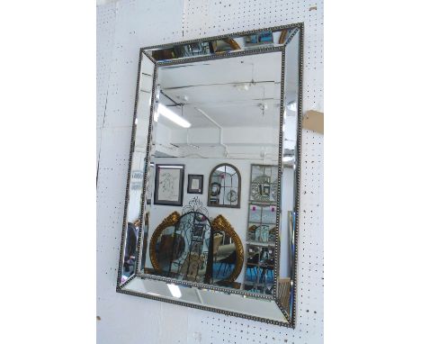 WALL MIRROR, rectangular bevelled mirror with marginal plates and beaded frame, 91cm x 61cm.