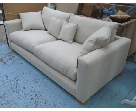 SOFA, two seater, in neutral fabric on block supports with four scatter cushions, 220cm L.