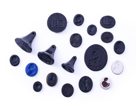A SELECTION OF MOSTLY WEDGWOOD AND WEDGWOOD & BENTLEY BLACK BASALT INTAGLIO DISCS AND SEALS VARIOUS DATES SECOND HALF 18TH CE