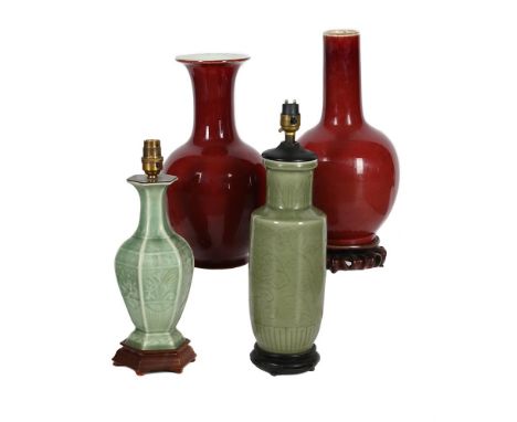 A GROUP OF CHINESE MONOCHROME GLAZED VASES 19TH OR 20TH CENTURY Comprising: two flambé glazed vases, 33cm high, 16cm diameter