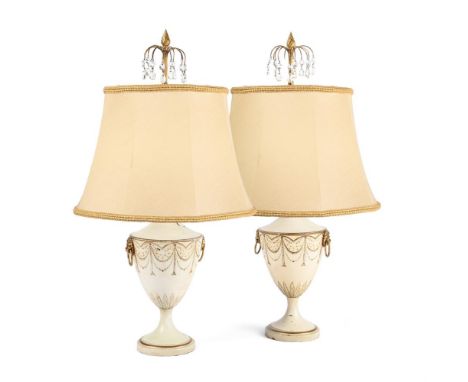 A PAIR OF CREAM AND GILT TOLE 'CHESTNUT URN' TABLE LAMPS IN REGENCY STYLE, OF RECENT MANUFACTURE With glass drop surmounts, l