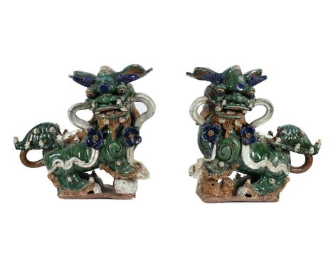 A LARGE PAIR OF CHINESE POLYCHROME 'TEMPLE DOGS' LATE 19TH OR EARLY 20TH CENTURY in the form of a pair of Buddhist lions, the