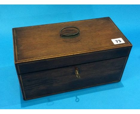 A mahogany tea caddy