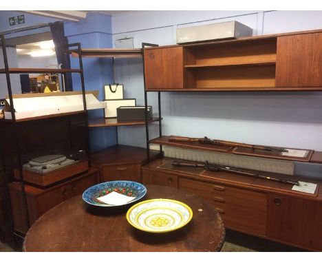 An Avalon teak and metal modular wall system to include wall unit, corner unit and shelf unit (3)