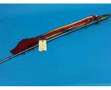 A Japanese 20th Century ceremonial sword with mon and sash (French Influence), length of blade 78cm