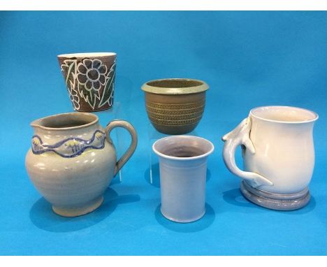 A Poole tankard with dolphin handle, a Carter Stabler jug, T313 and three Poole vases (5)