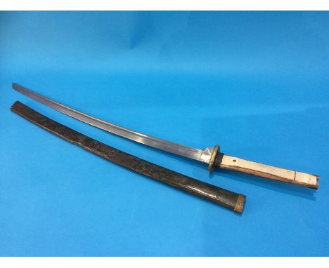 A Japanese Katana with metal green painted scabbard and worn shagreen handle, length of blade 68.5cm