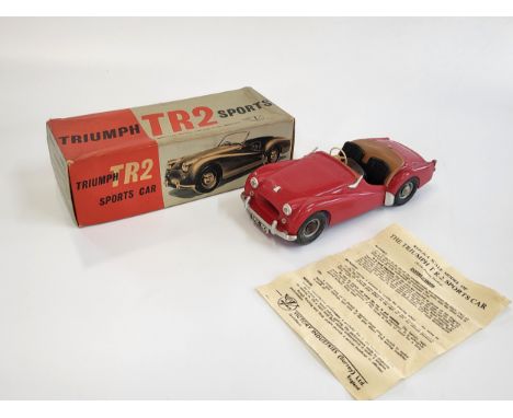 Victory Models battery operated 1/18 scale Triumph TR2, 21.5cm with original box and instruction sheet.