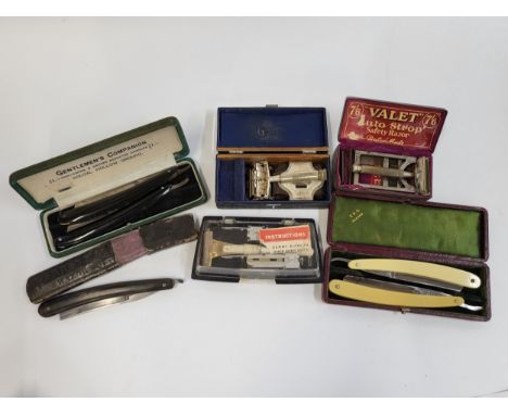 Five cut throat razors (a Bengall plus four others), three boxed vintage razors, one a valet, a Schick and a Wilkinson Sword.