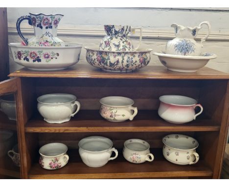 A Mason's Ironstone jug with basin 41cm diameter, two jugs with matching bowls (one basin with glue repair), and seven cerami