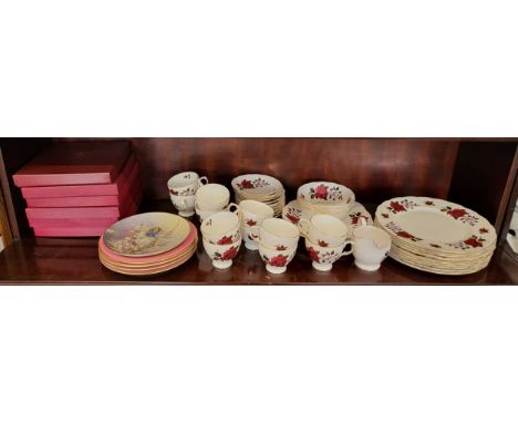 A Colclough crimson rose pattern part tea service, four porcelain floral pattern plates with pink borders 22cm diameter, six 
