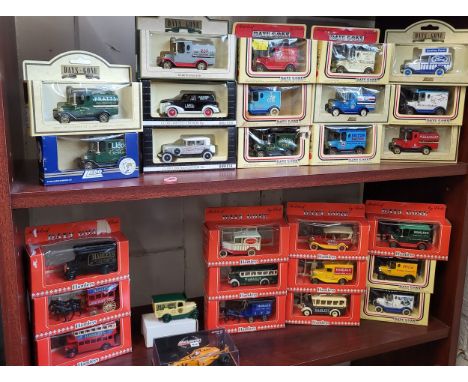 Twenty-seven Lledo Days Gone diecast commercial vehicles including Texaco, Esso and hamley's in window boxes and Minichamps M