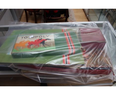 Early board games to include Totopoly, Hunting, Touring and Milestones 
