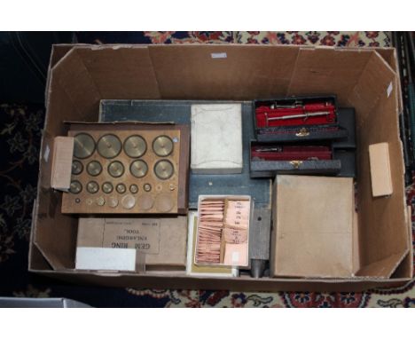 A good box of assorted horology and jewellery restoration tools and equipment, including setting tools, watch faces, ear piec