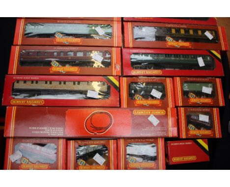 Hornby Railways OO scale seven boxed wagons and seven boxed coaches, track, etc 