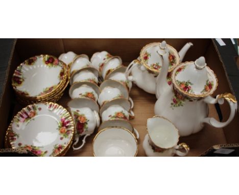 A ten piece Royal Albert country roses tea service, including tea pot and hot water/coffee pot 