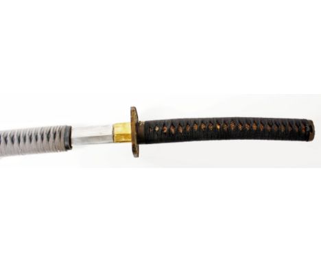 A Japanese samurai sword katana with 70 cm blade and  visible hamon, tang not viewed, grip shagreen covered and bound  with b