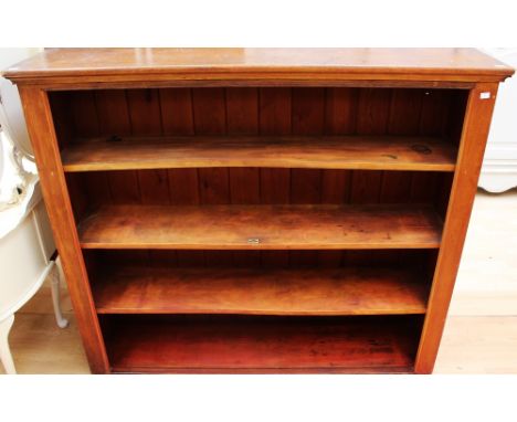 A large pitch pine four tier book shelf, height 122cm x width 142cm x depth 35cm.