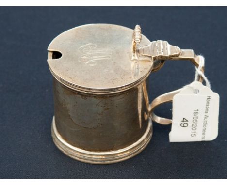 A George V silver drum shaped mustard hinged cover, engraved with initials, blue glass liner, maker Haseler Brothers, London 