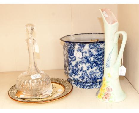 A large blue and white jardiniere, with a Radford jug, a pocket, two Royal Doulton plates and a decanter with stopper 