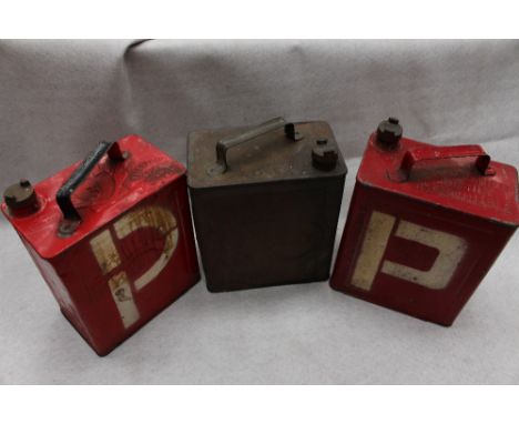 Three metal petrol cans, circa 1940, used by Auxilary Fire Service Esso, Valour and Shellmex, two painted Fire Service red, a