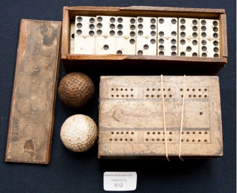 A box of ebony and bone (full set) of dominoes - Edwardian in original box (May Bole) cribbage box and two vintage golf balls