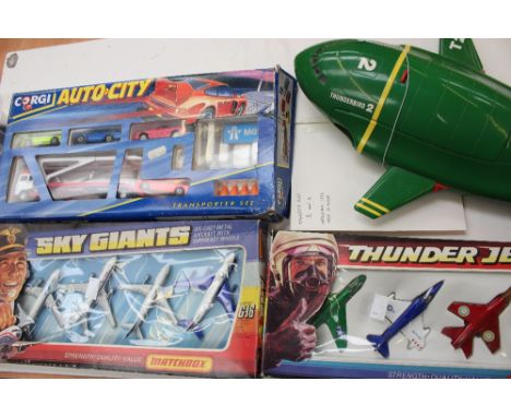 Boxed Corgi Auto City, Matchbox Sky Giants and Thunder Jets sets and large scale Thunderbird 2 and loose diecast 