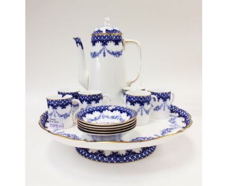 A Royal Worcester blue and white footed cake stand, holding a matching coffee pot, six coffee cans (one af) and five saucers 