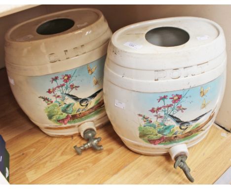 A pair of ceramic spirit barrels with tap dispensers, labelled 'Gin' and 'Port' each depicting birds and foliage around a tre