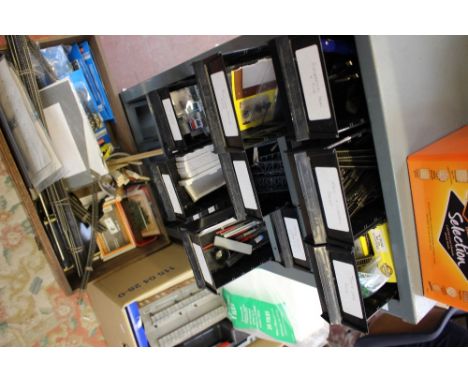 A large quantity of N Gauge model railway track, lineside accessories, Peco kits and tools housed in a large metal small draw