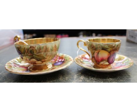 Two Aynsley gilt/printed cabinet cups/saucers (2) 