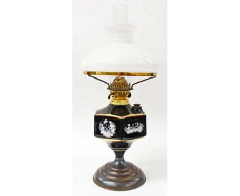 An oil lamp with black and white base 