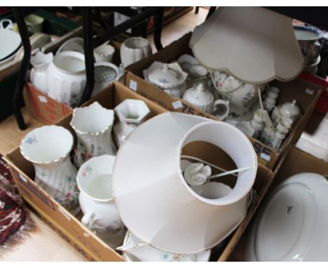 A large collection of Aynsley 'Wild Tudor' comprising vases, table lamps, bowls, candlesticks, jar and cover, coffee pot, tri