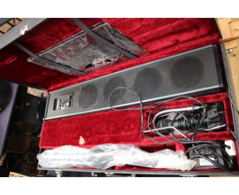A portable PA system, with speaker, microphone, stand, instructions, etc, in carry case 