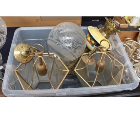 An oil lamp; together with two lantern style hanging lights 