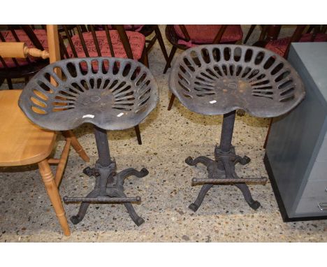 Pair of novelty stools, the seats formed as tractor seats