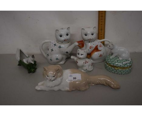 A Nao model of a cat plus various other cat ornaments